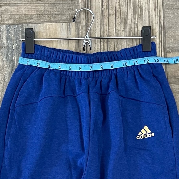 Adidas ESSENTIALS WARM GOLDEN LOGO PANTS size small - Picture 9 of 10